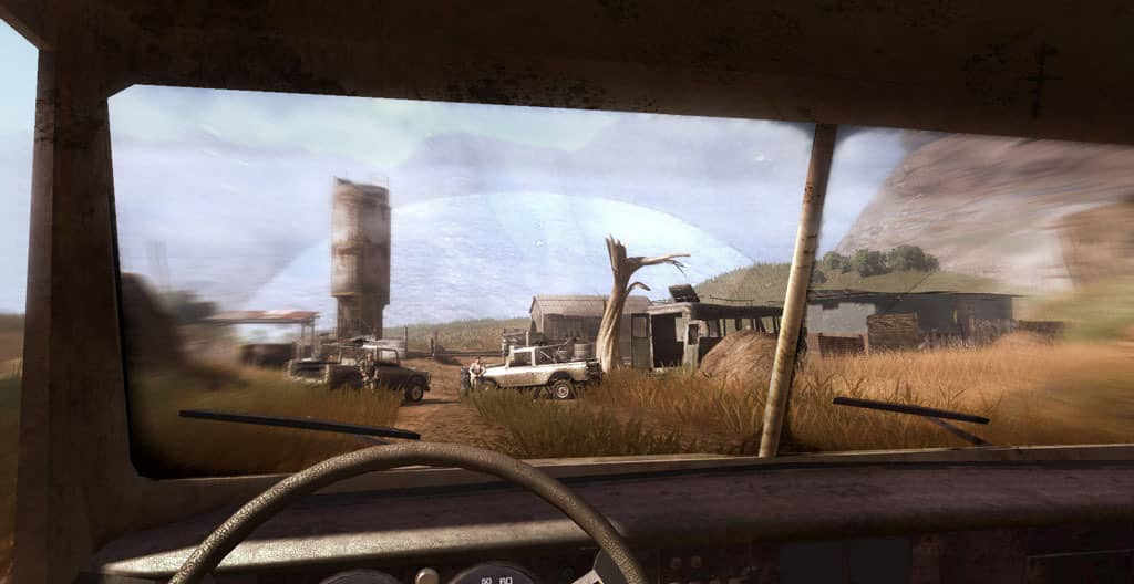 Góc nhìn từ trong xe ô tô ra ngoài, cảnh khu trại đổ nát trong một ngôi làng ở Far Cry 2