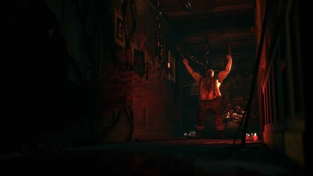 The Beast Inside, gã mập to lớn bị treo bằng xích trong căn phòng đầy máu.
