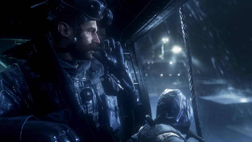 Trải nghiệm những pha hành động kịch tính và đầy nguy hiểm trong Call of Duty Modern Warfare Remastered. Call of Duty Modern Warfare Remastered - Lính đặc nhiệm nhìn ra ngoài từ trực thăng trong một nhiệm vụ dưới trời bão tuyết.