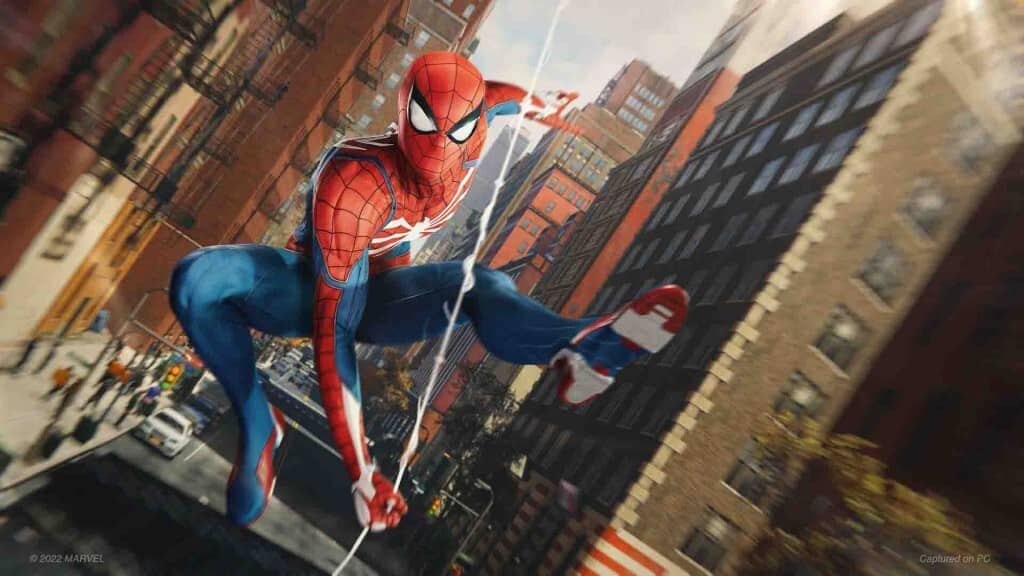 Cảnh quay gameplay đẹp mắt của Spider-Man Remastered trên PC. Người Nhện đu tơ giữa các tòa nhà chọc trời New York với đồ họa chi tiết và ánh sáng đẹp mắt.
