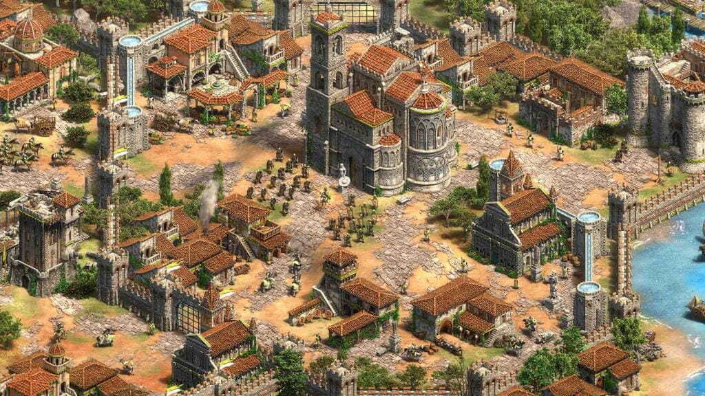 AOE 2 DE gameplay thành phố Địa Trung Hải với tháp chuông nhà thờ và tường thành