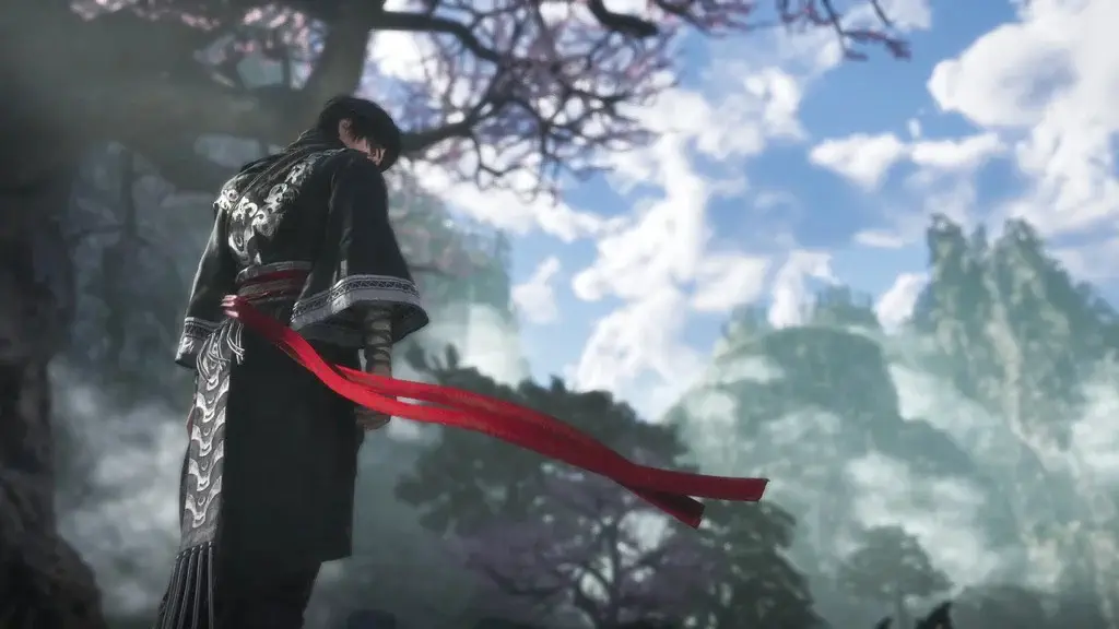 Nhân vật chính đứng nhìn phong cảnh núi non hùng vĩ trong game DYNASTY WARRIORS ORIGINS