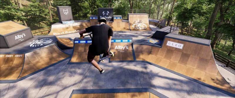 Khu vực tập luyện và biểu diễn phức tạp trong game ScootX, đầy thử thách Tay đua nhảy qua các chướng ngại vật gỗ trong khu vực trượt ván ngoài trời của ScootX