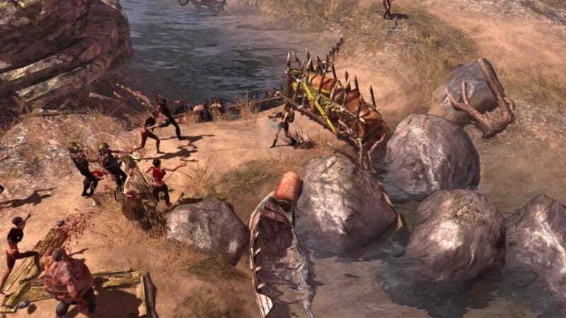  Hình ảnh gameplay How to Survive cho thấy nhân vật đang chiến đấu với nhiều zombie trên bờ biển, gần các tảng đá lớn.