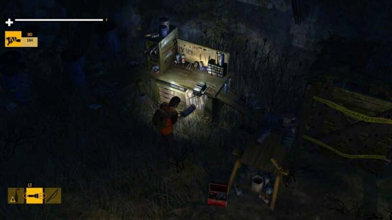 Hình ảnh gameplay How to Survive bên trong một hang động hoặc hầm tối, nhân vật dùng đèn pin khám phá và tìm kiếm tài nguyên.