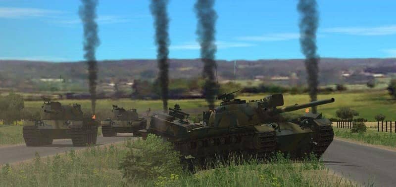 Trải nghiệm cảm giác chỉ huy lực lượng thiết giáp hùng hậu trong Combat Mission Cold War. Combat Mission Cold War, một đoàn xe tăng chiến đấu di chuyển trên đường.
