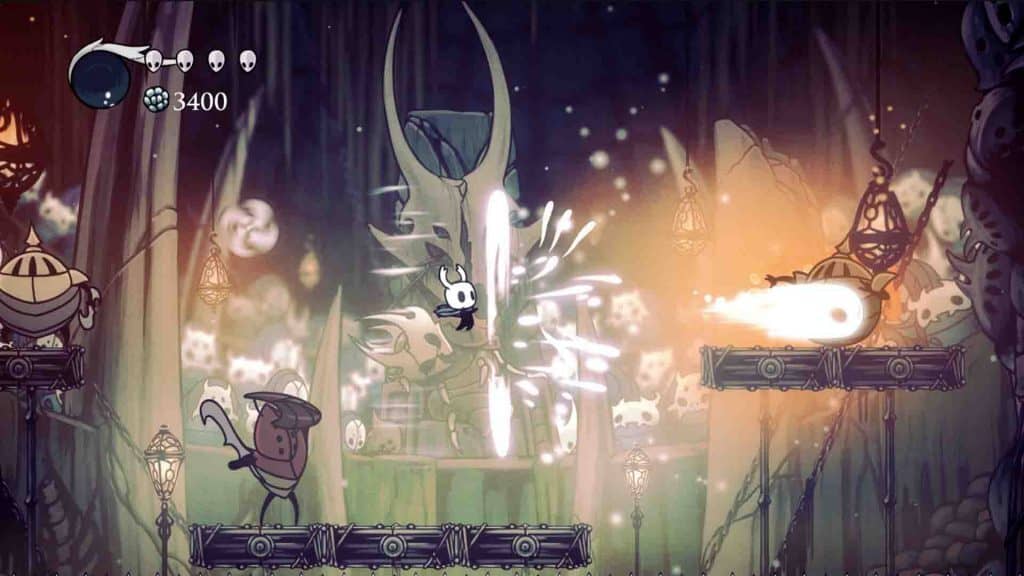 Hiệp sĩ chiến đấu với kẻ thù golem trong Hollow Knight