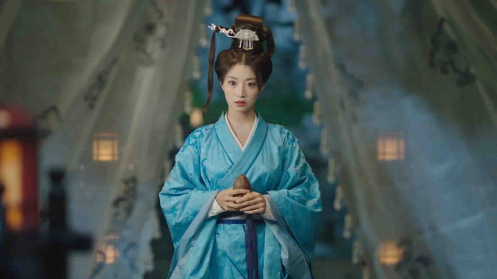  Restart ShuHan Dynasty Origin: Một nhân vật nữ chính đứng trang nghiêm trong trang phục cổ trang màu xanh.