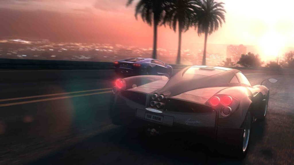 The Crew - Đua siêu xe, khám phá thế giới mở rộng lớn! The Crew - Siêu xe Pagani và Lamborghini đua trên đường cao tốc ven biển, thành phố về đêm lấp lánh.