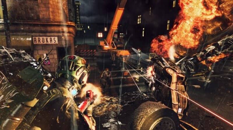 Umbrella Corps: Trải nghiệm chiến đấu sinh tồn giữa Raccoon City đang bùng cháy trong multiplayer. Umbrella Corps gameplay: Trận chiến multiplayer khốc liệt trong thành phố đổ nát, mưa và lửa cháy dữ dội.