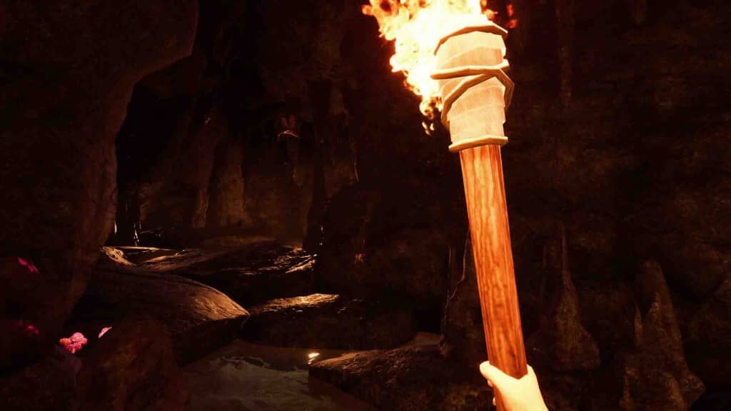 Khám phá bí ẩn hang động trong Under A New Sun - Ánh sáng dẫn lối. under a new sun gameplay, người chơi dùng đuốc khám phá hang động.