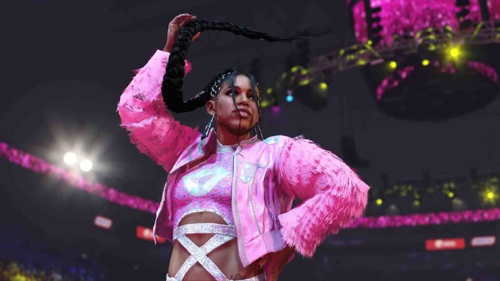 Bianca Belair - The EST của WWE trong WWE 2K24. WWE 2K24, đô vật Bianca Belair với trang phục màu hồng rực rỡ và bím tóc dài đặc trưng.