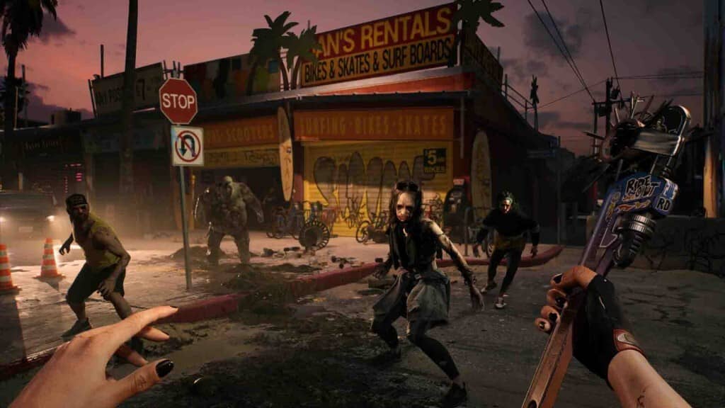 Dead Island 2 gameplay: Đấu với zombie trên đường phố Venice Beach lúc chạng vạng Cảnh chiến đấu trong Dead Island 2 vào lúc hoàng hôn ở bãi biển, với cửa hàng bán đồ thuê "Dan's Rentals" và nhiều zombie