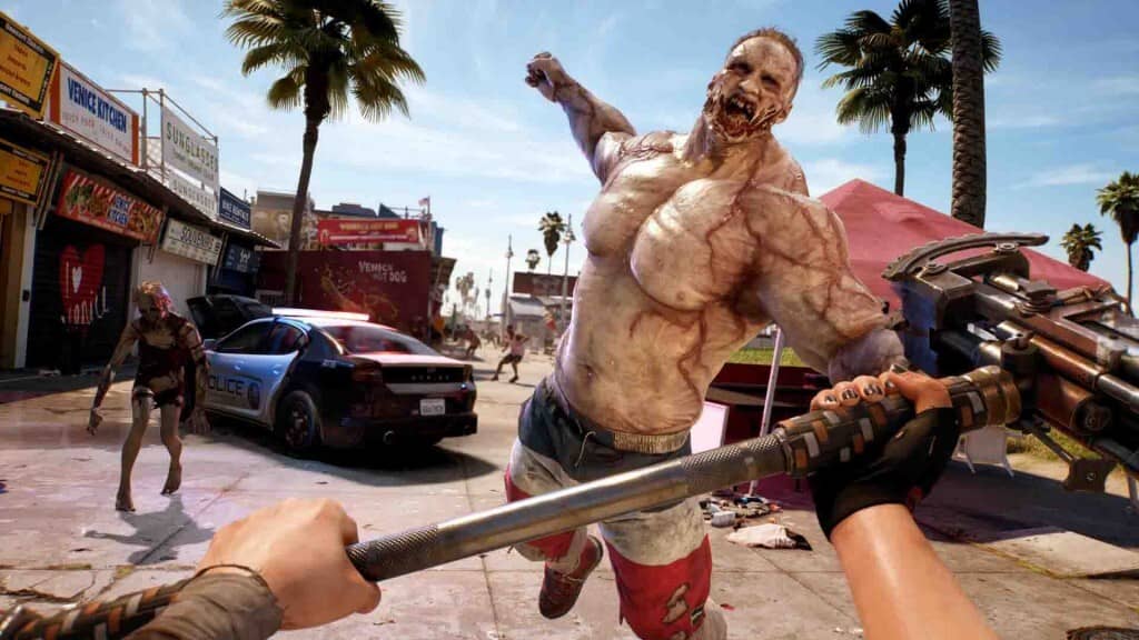 Dead Island 2: Cuộc chiến với zombie đặc biệt (Slobber/Butcher) trên bờ biển đầy nắng Người chơi Dead Island 2 đối mặt với một zombie khổng lồ cơ bắp (Butcher hoặc Slobber) trên bãi biển California