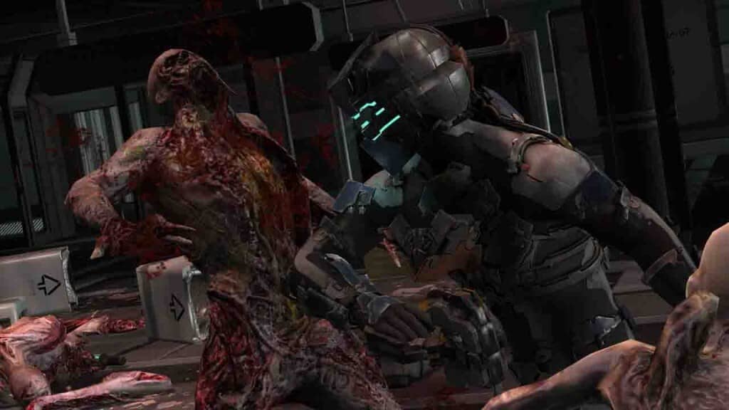 Dead Space 2: Isaac Clarke trong bộ giáp RIG Plasma Cutter chống lại Necromorph ghê rợn ở hành lang đổ máu.