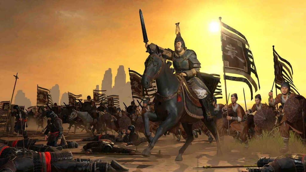 Total War Three Kingdoms ảnh tướng kỵ binh giơ kiếm trên chiến trường hoàng hôn
