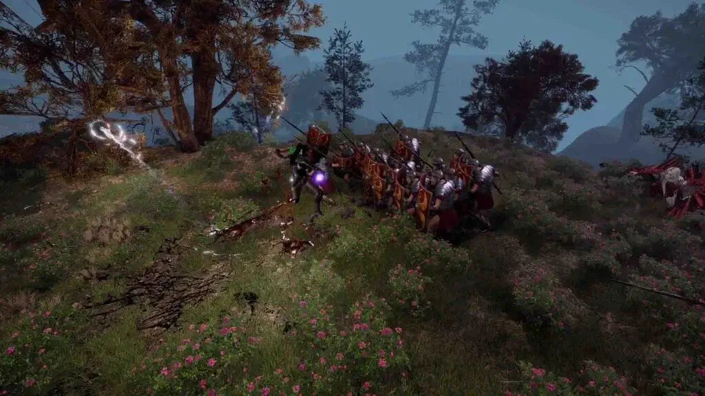 Cảnh gameplay đội nhóm trong "Ash & Rust", hiển thị một đội quân lớn các chiến binh kiểu La Mã, trang bị giáp kim loại, khiên đỏ hình chữ nhật và giáo dài, đang xếp hàng tấn công trên một sườn đồi phủ đầy hoa hồng nhỏ. Một chiến binh với vệt sét sáng tím bao quanh đang dẫn đầu đàm công phía trước. Bối cảnh rừng thông và bầu trời sương mù tạo cảm giác một trận chiến quy mô lớn trong chế độ co-op hoặc PvP.