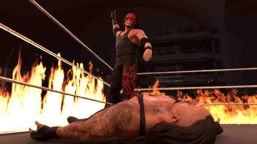 Gameplay WWE 2K26 đô vật mặt nạ Kane trên võ đài lửa
