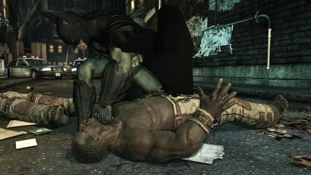 Hiệu ứng chiến đấu của Batman Arkham Asylum Game of the Year Edition khi Batman khống chế tội phạm trong đêm.