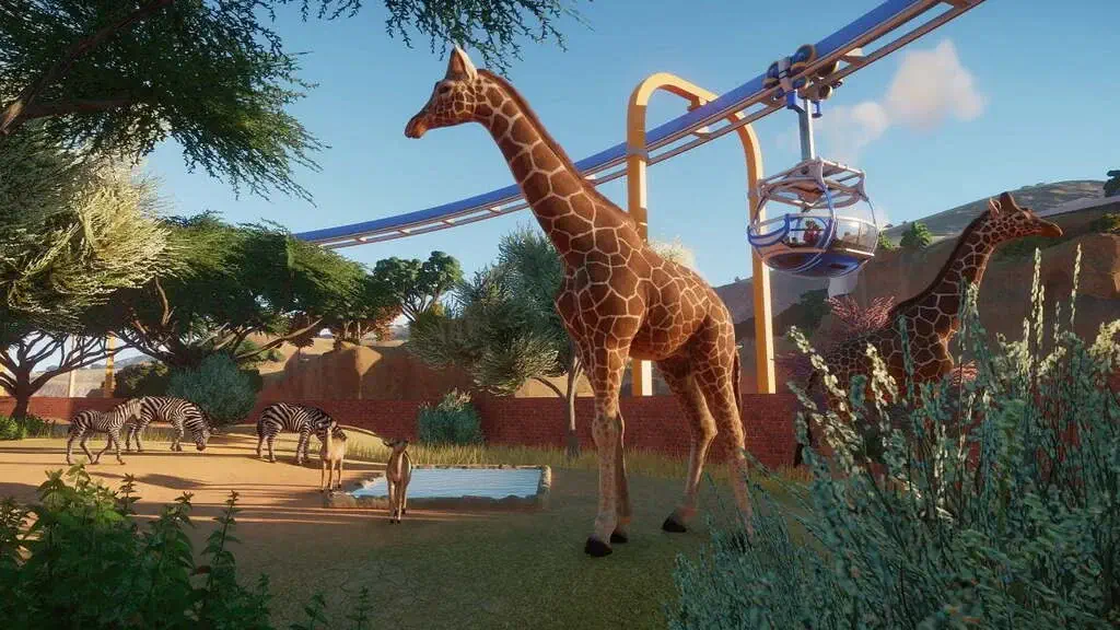 Gameplay Planet Zoo xây dựng khu bảo tồn động vật hoang dã Hươu cao cổ và hệ thống cáp treo trong game Planet Zoo